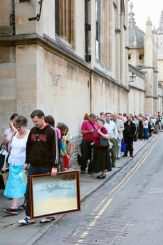 The BBC television program Antiques Roadshow filmed its 31st series at Hertford College, Oxford. Here members of the public queue in the hope of having their antiques discussed and valued.