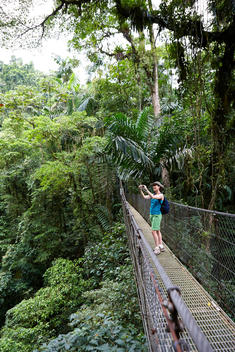 Jungle hike, taking pictures, walking bridge, tourist