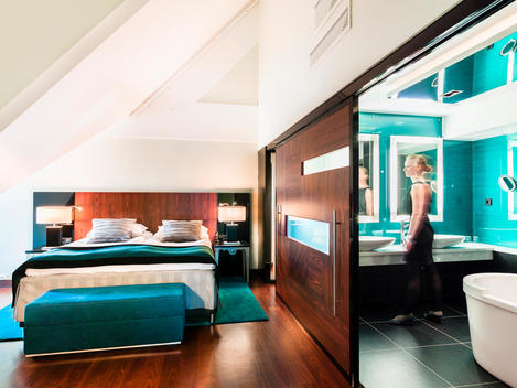 Bedroom and on suite bathroom at Radisson Blu Royal Hotel, designed by Link Arkitektur, Bergen, Norway.