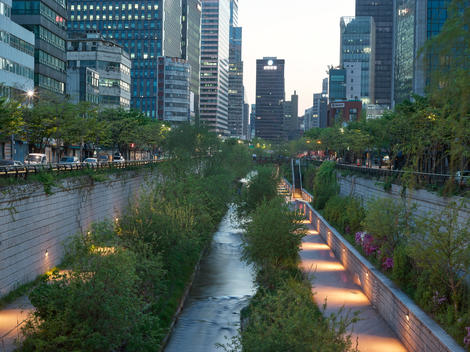 Cheonggyecheon Stream is a modern public recreation space in downtown Seoul. The massive urban renewal project is on the site of a stream that flowed before the rapid post-war economic development caused it to be covered by transportation infrastructure.