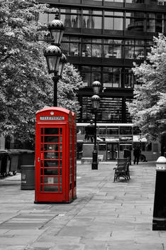 UK, London, red old telephone box in the city
