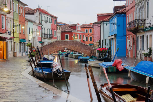 Boats in Burano Canal During a Rain Shower