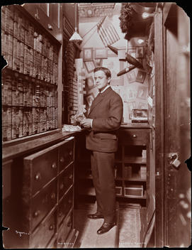 Mr. Gane, Treasurer Of The American Theatre, Pictured In The Theater\'S Box Office.
