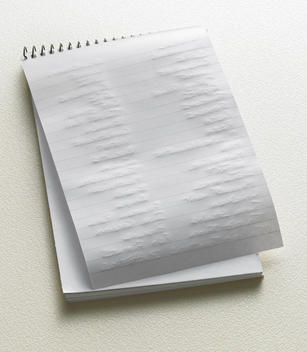 Still-Life Of List On Paper Notebook