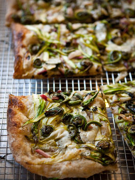 Green Tart Pizza With Asparagus, Wild Foraged Ramps And Fiddleheads, Meyer Lemon Zest, Creme Fraiche, Pecorino Romano, And Pain Au Levain Crust At The Wood Fired Bakery The Vergennes Laundry.