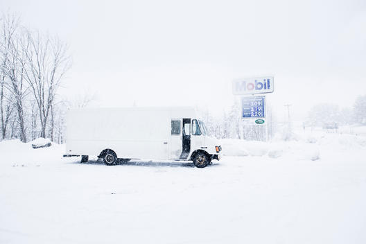 White Service Truck In Winter Landscape