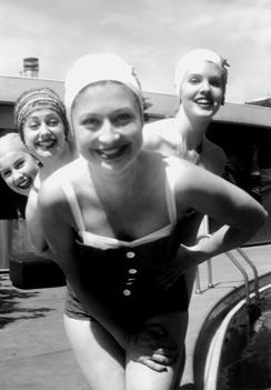 Black And White Image Of Women In 1950'S Swimming Costumes And Swim Caps
