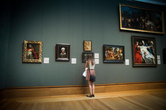 A girl observing art at the Getty Museum