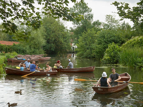 Tourists ride in paddle boats on the River Stour at Flatford in East Bergholt. The nearby mill was owned by the artist John Constable\'s father and is noted, along with its immediate surroundings as the location for many of Constable\'s works.