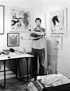 A portrait of the artist, Christopher Reiger in his studio, with his cat, Mr. Misi.