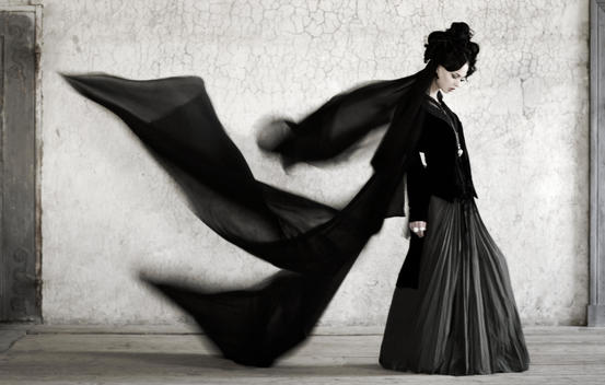 Woman Wearing Large Dress And Long Black Veil
