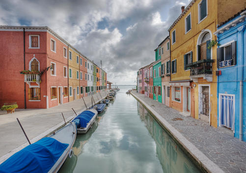 Colorful Buildings and Boats Lining a Canal