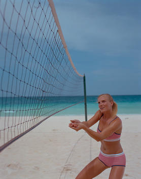 Woman Playing Beach Volleyball