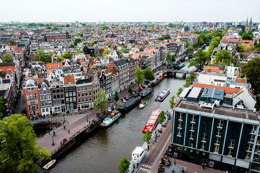 The view looking down from Westerkerk church at the canals of Amsterdam and the Anne Frank House.