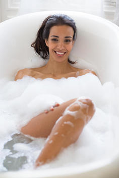 Smiling Woman in Bubble Bath
