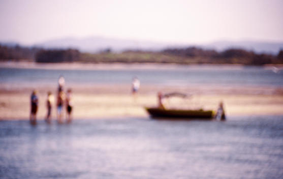 People On A Sand Bank With A Boat On Wallis Lake, Forster