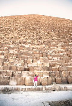 Mature woman tourist at The Great Pyramid of Giza, Egypt