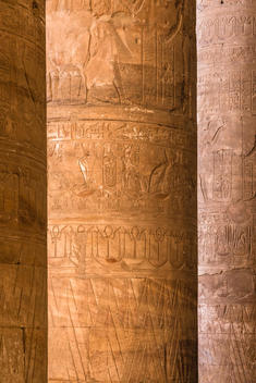 Hieroglyphics at the Temple of Edfu, an ancient Egyptian temple located on the west bank of the Nile in the city of Edfu, Egypt, Africa.