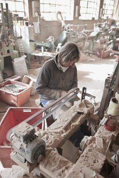 Carpenter working in woodshop