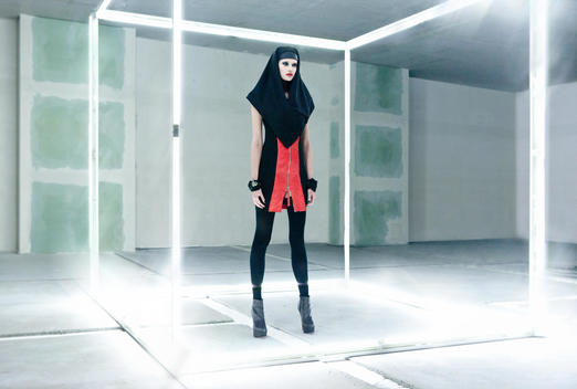 Fashion Image Of Woman In Light Cube In Studio