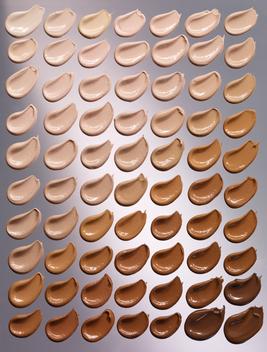 Smears of make-up of a variety of foundation colours for many skin tones