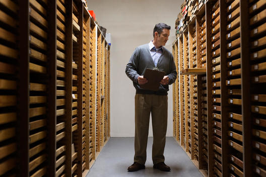 Man working in museum archive