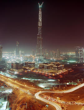 View Of The Unfinished Burj Khalifa And Illuminated Cityscape Of Dubai, United Arab Emirates.