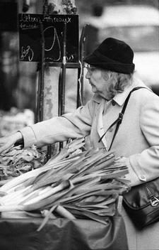Black and white photograph of elderly ladies shopping
