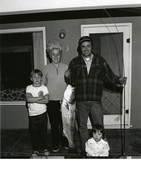 A family shows a prize winning fish