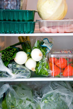 Refrigerator filled with fruit and vegetables