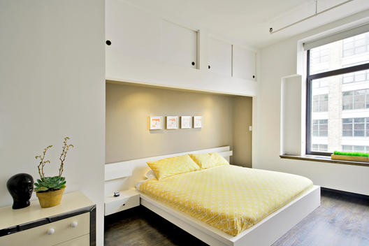 Clean Bedroom With Spare Lines, Yellow Bed, Large Window