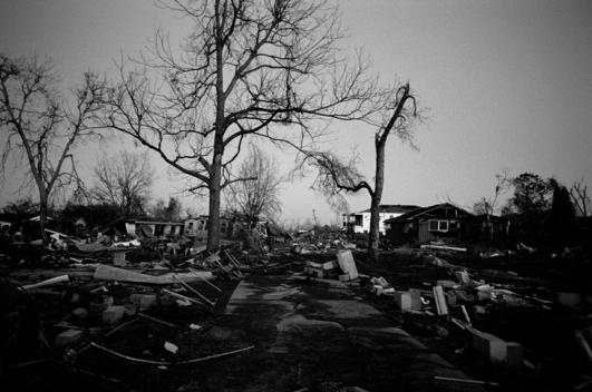 New Orleans, Louisiana USA February 28, 2006 Sunset in the lower ninth ward as Mardi Gras and Fat Tuesday come to and end. It was poor area completely destroyed when the levees broke flooding the area after hurricane Katrina.