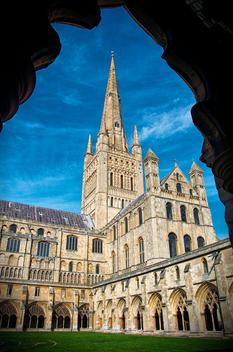 Norwich Cathedral seen through a gothic arch