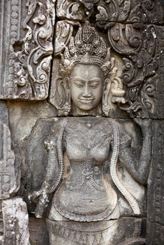 Bas Relief 'Devatas' decoration inside the temples at Angkor Wat