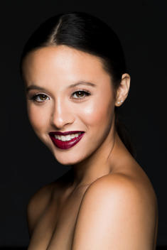 Portrait of Young Woman with Dark red Lips