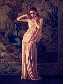 Portrait Of Fashionable Woman Wearing A Pink Evening Dress.