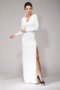 Woman wearing white gown, studio shot