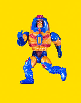 An old He-Man action figure toy