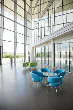 Chairs and table in office lobby area