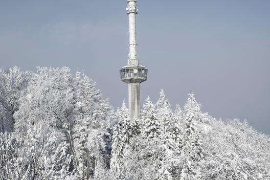 communications tower on uetliberg covered in snow