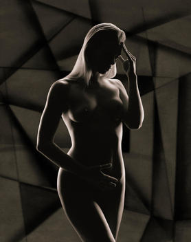 Silhouette Of Nude Woman With Hand To Head Against Abstract Background.