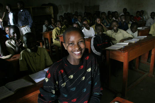 Muhorakeye (which means always happy) lost her father in the 1994 genocide and was also attacked herself. She is seen here at school in Kanzenze, Rwanda, East Africa. 10th anniversary of the Rwandan Genocide, April 2004. Part of their education includes \'