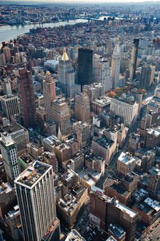 Aerial View Of Manhattan Spanning Down The River With Skyscrapers Dotting The Landscape. Midtown, New York, New York.