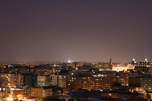 Overview of Washington DC at dusk with Capitol building in background