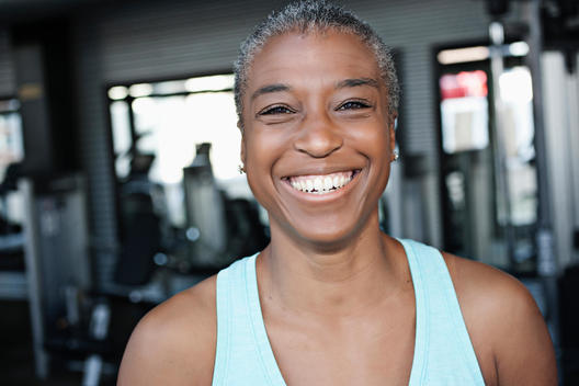 Smiling African American woman in health club