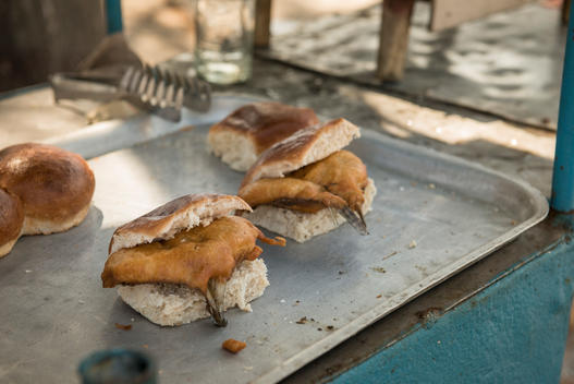Deep Fried Fish Sandwiches on a Tray Ready to be Sold on a Cuban Food Cart. Santa Clara, Villa Clara, Cuba