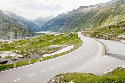 View Of A Curvy Mountain Street In The Swiss Alps.