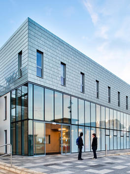 Student\'s standing outside of the School of Arts, Kent University designed by Hawkins\Brown Architects, Canterbury, UK.