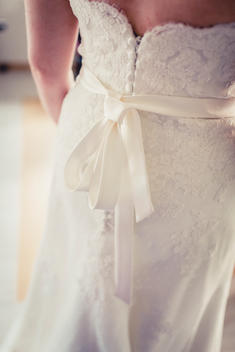 bride gets dressed, corsage