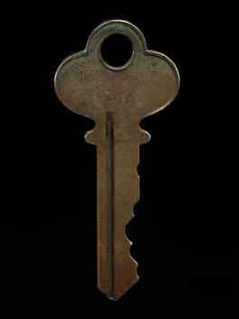 Old key on black